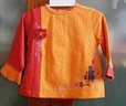 Alphabet เสื้อส้มแขนยาวและระบายตรงแขน สกรีนลายตรงชายเสื้อ size 6 months